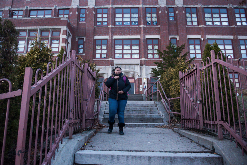 Monet Spencer, 18, walks from Pittsburgh Miller PreK-5 after tutoring young elementary students on February 13, 2017. Thirty percent of Spencer's salary from her tutoring job helps pay for her apartment at Action Housing's My Place, which provides housing and intensive case management services to young people who have aged out of the foster care system in Allegheny County and are either homeless or at risk homelessness.