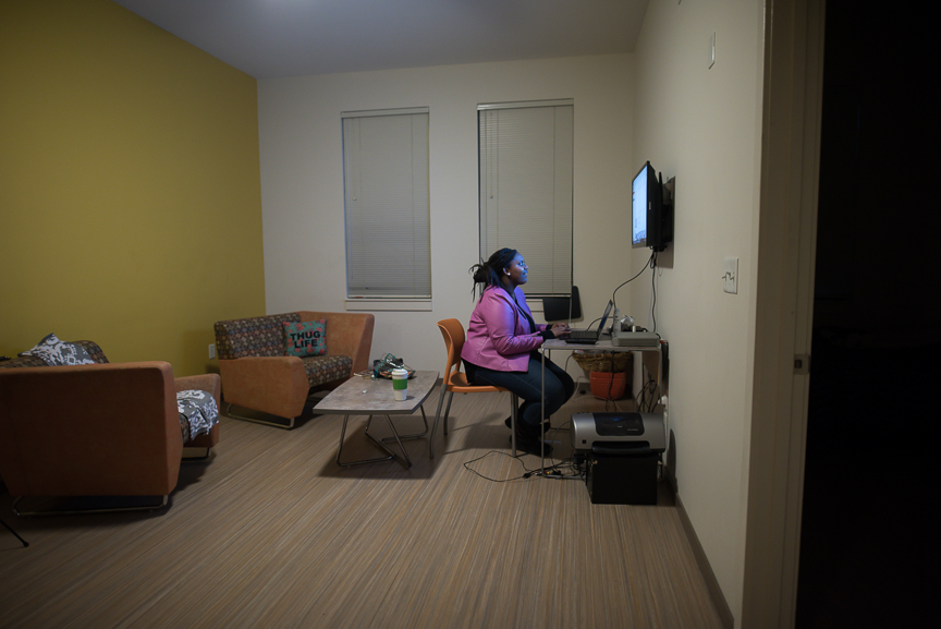 This is Monet Spencer's home. Here, she's looking through videos on her computer. She uses her phone to connect to the Internet through a hotspot. Spencer and her twin brother were considered homeless after their mother died. Spencer eventually acquired an apartment through ACTION-Housing's MyPlace Youth program. "It was the happiest day of my life," Spencer says about getting her own apartment.