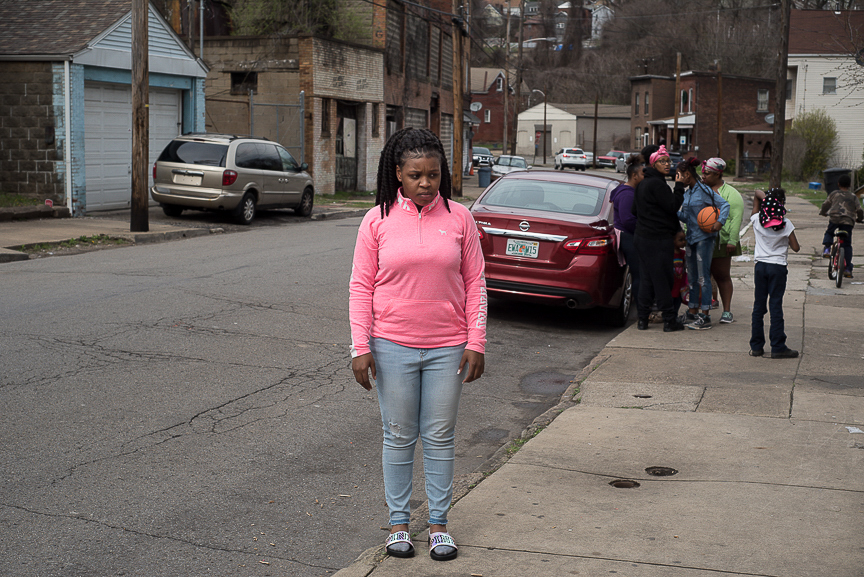 As the family gathered for her son's second birthday, Dezmaire Baker watched after him and stood near the edge of the sidewalk to stop Dorian from running into the street.