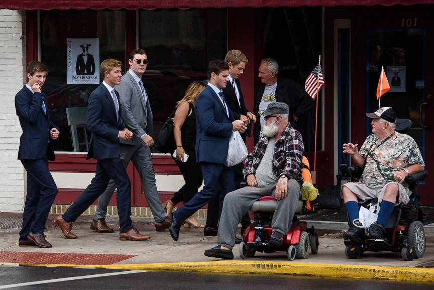 Members of the Beta Theta Pi fraternity walk to the Centre County courthouse after a break in the 7th day of the fraternity members' preliminary hearing on Aug. 31, 2017 in Bellefonte, Pa.