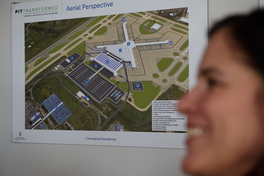  Christina Cassotis, Allegheny County Airport Authority chief executive, stands near a conceptual rendering of the future plans for the Pittsburgh International Airport on Thursday, December 14, 2017 in Moon, Pa. 
CREDIT: Justin Merriman for The Wall