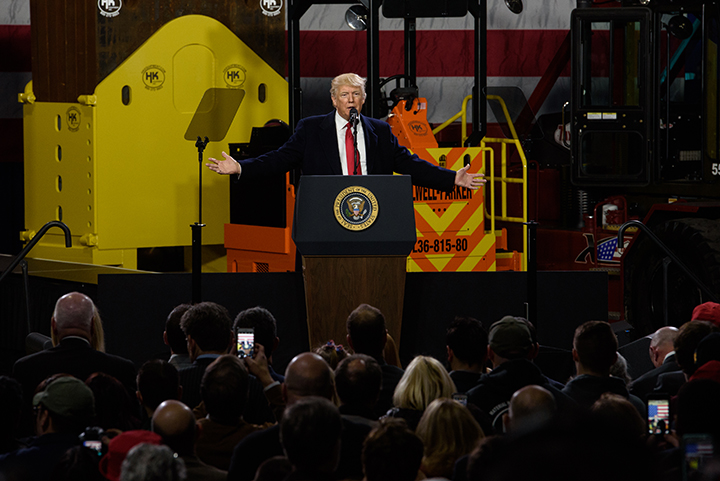  President Donald Trump speaks to an invited crowd of several hundred supporters during an official visit at H&K Equipment, a rental and sales company for specialized material handling solutions in North Fayette, Pennsylvania, on January 18, 2018. Tr