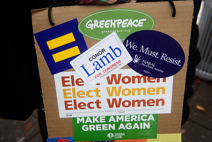  A Conor Lamb supporter has a 'Conor Lamb for Congress' sticker on her sign as she joins in The Women's March on Washington - Pittsburgh "Power to the Polls" in Market Square on Sunday afternoon, January 21, 2017 in downtown Pittsburgh. Thousands cam