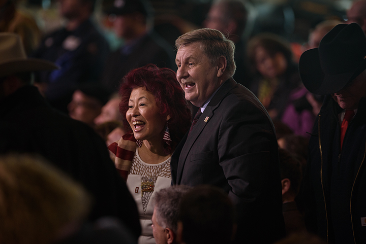  Republican nominee for congress Rick Saccone and his wife, Yong, talk with guests prior to the arrival of President Donald Trump for an official visit at H&K Equipment, a rental and sales company for specialized material handling solutions in North 