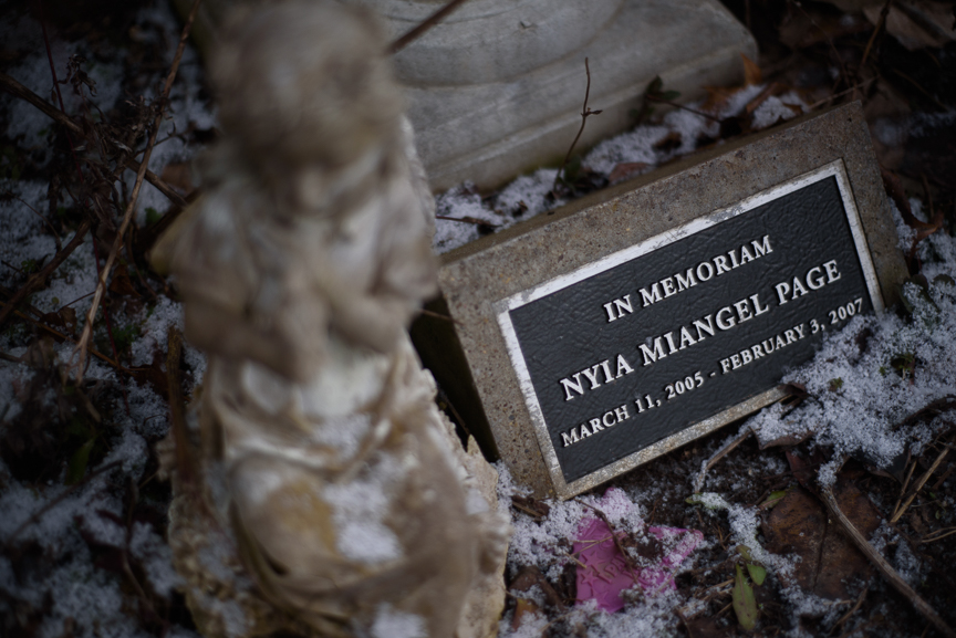  A memorial for Nyia Page is dusted with freshly fallen snow on Jan. 25, 2018, in Rankin, Pa.  