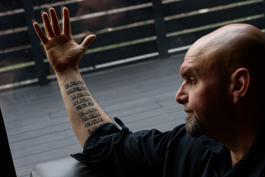  Braddock Mayor John Fetterman shows tattoos on his arm for every homicide in Braddock including Nyia's death on Feb. 3, 2007. He considers her murder the worst day of his time in office as mayor.  