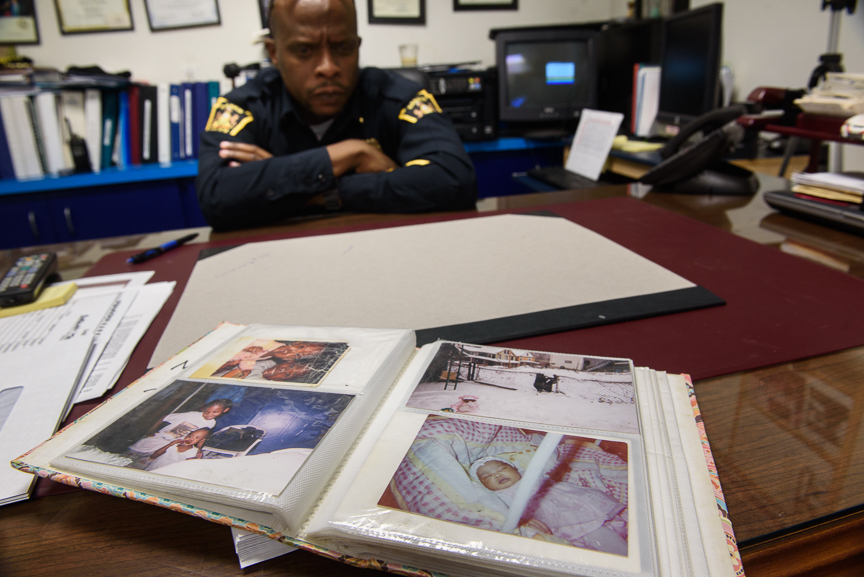  Rankin Police Chief Ryan Wooten sits in his office with a family album of photographs of Nyia Page on Jan. 25, 2018 in Rankin.  
