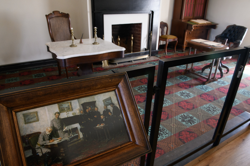  A painting depticting General Robert E. Lee's surrender to General Ulysses Grant hangs in the parlor of the McLean House where the surrender took place on Monday, March 26, 2018 at Appomattox Court House National Park in Appomattox, Virginia. 