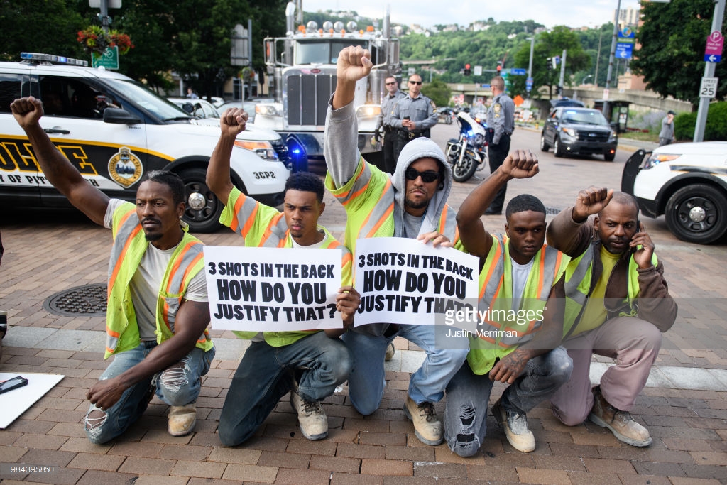  Construction workers walked off the job to join a protest a day after the funeral of Antwon Rose II on June 26, 2018 in Pittsburgh, Pennsylvania. Rose was killed by an East Pittsburgh police officer on Tuesday, June 19 when he fled on foot from a tr