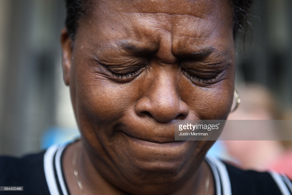  Carmen Ashley, the great aunt of Antwon Rose II, cries during a protest calling for justice for the 17-year-old on June 26, 2018 in Downtown, Pittsburgh, Pennsylvania. Rose was killed by an East Pittsburgh police officer on Tuesday, June 19 when he 