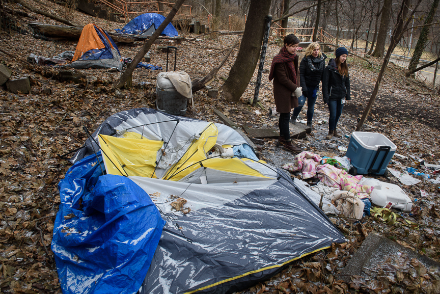  Operation Safety Net's Janice Kochik, a nurse practitioner (center), and Calla Kainaroi, an outreach specialist (left), and Kelsi Bockenhauer, a registered nurse, walk through a transitional camp for people experiencing homelessness on Jan. 24, 2018