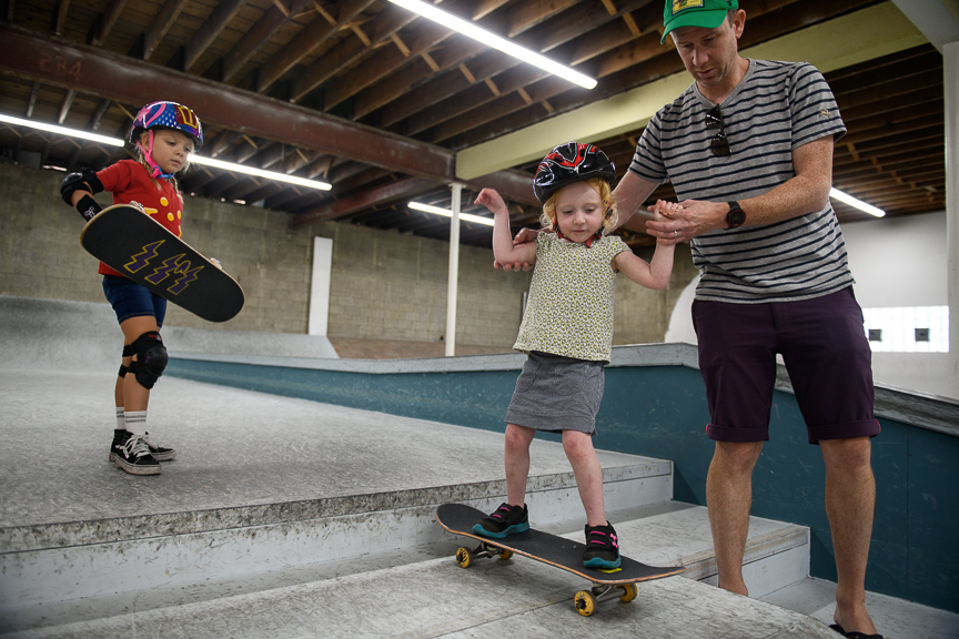  Frankie Wolber of Edgewood, Pa., left, watches Ryan Eckel, of Point Breeze, Pa., help his daughter, Sage, 3, skate at Switch and Signal Skatepark on Sept. 1, 2018 in Swissvale, Pa. 