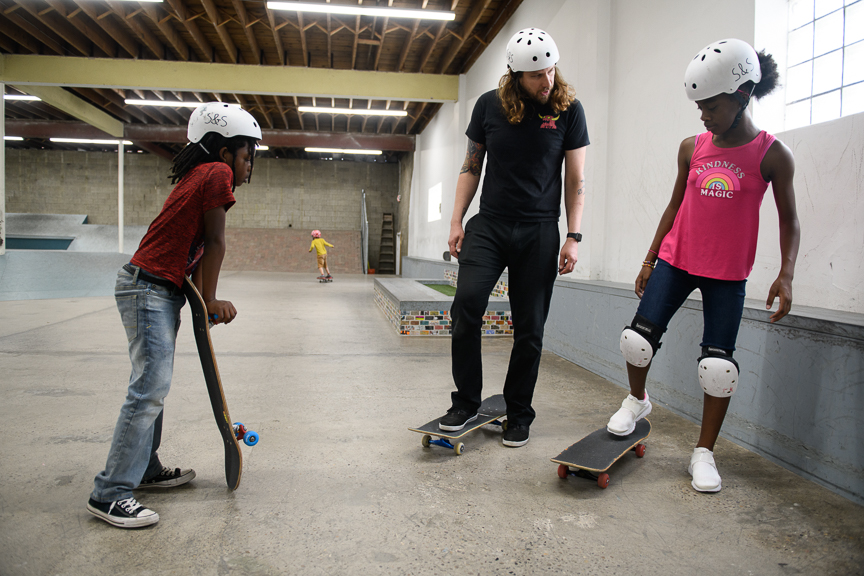  Kerry Weber, 37, owner of Switch and Signal Skatepark, helps teach kids to skate on Sept. 1, 2018 in Swissvale, Pa. 