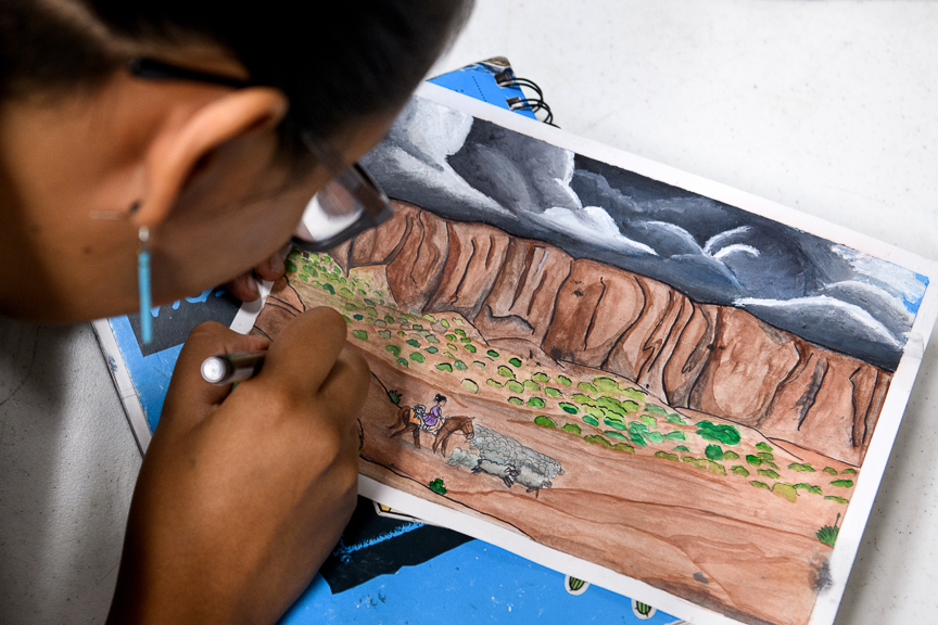  Syiera Tsosie, 14, works on a painting as she takes a break from working on the development of Duolingo's Navajo language course at San Juan High School on October 1, 2018 in Blanding, Utah. 