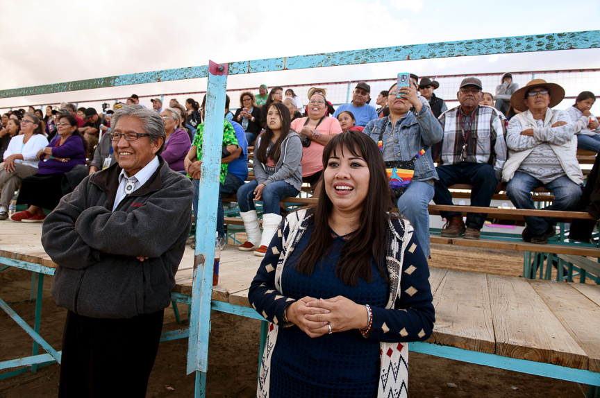  Clayton Long, left, and Charlotta Lacy, right, watch the crowning of Miss Northern Navajo is crowned at the Shiprock Northern Navajo Nation Fair on October 5, 2018 in Shiprock, New Mexico. The fair is the the oldest and most traditional of the Navaj