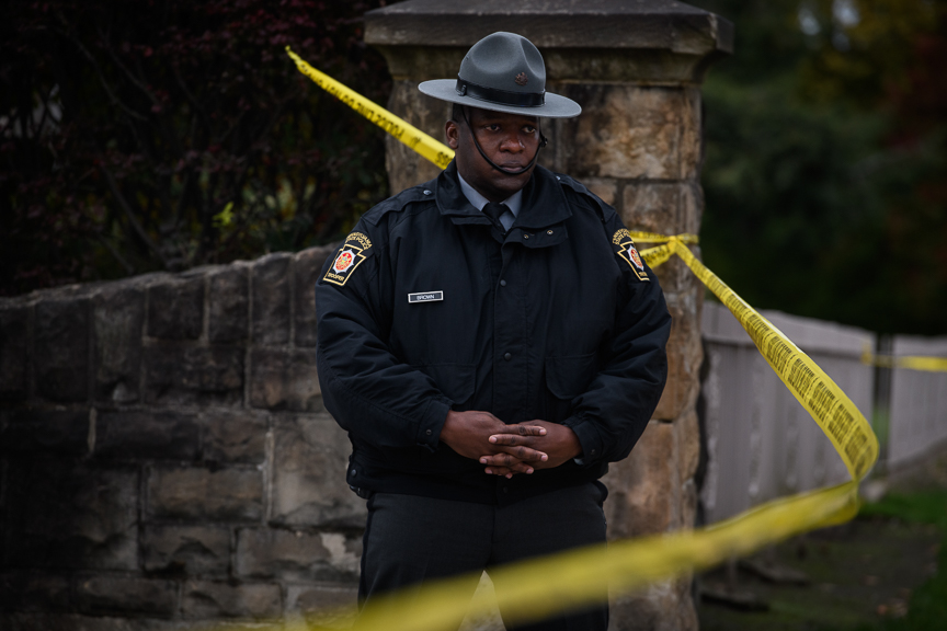  A Pennsylvania State Police Trooper stands watch near the Tree of Life Synagogue on Monday, October 29, 2018. 