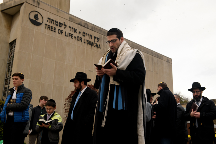  Members of the Jewish faith gather in front of the Tree of Life Synagogue for the Shabbat on Friday evening, November 2, 2018 in Pittsburgh's Squirrel Hill neighborhood.  