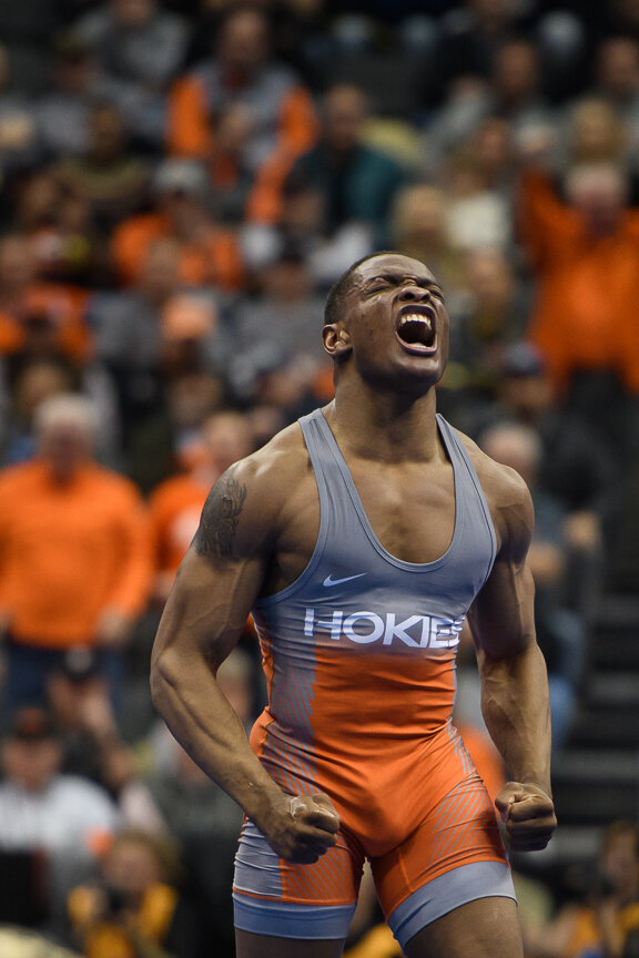  Mekhi Lewis of the Virginia Tech Hokies celebrates after his upset victory over number one seed Alex Marinelli of the Iowa Hawkeyes during the quarterfinals of the NCAA Wrestling Championships on March 22, 2019 at PPG Paints Arena in Pittsburgh, Pen