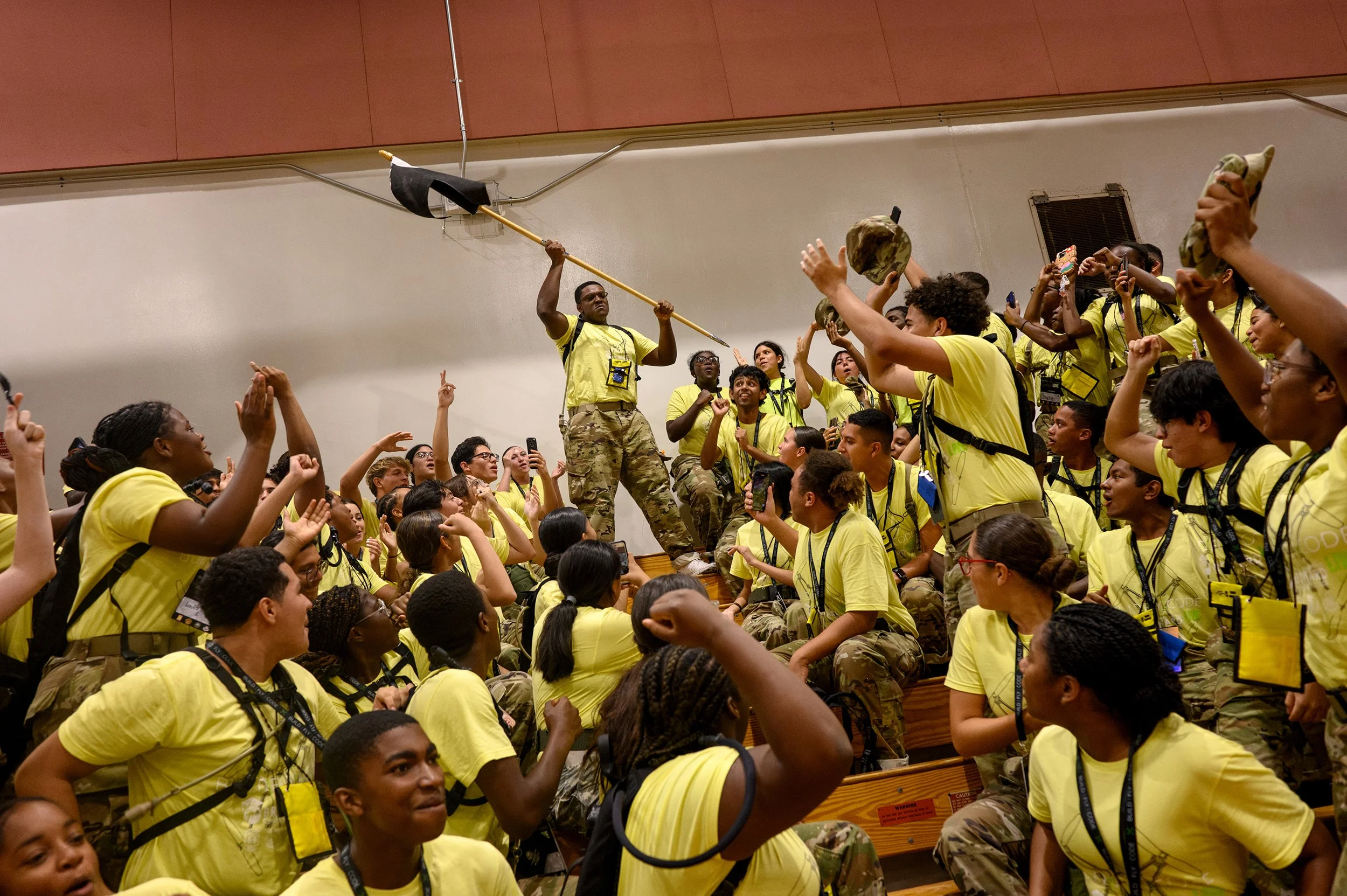  North Area Army Junior Reserve Officers’ Training Corps (JROTC) students cheer at Boyd H. Anderson High School in Ft. Lauderdale, Florida.   