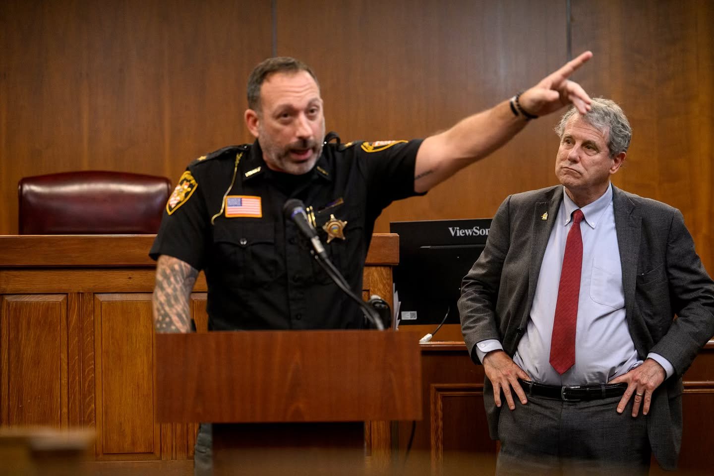 Ohio Senator Sherrod Brown, D-Ohio, right, listens on as Jefferson County Sheriff Fred Abdalla, left, speaks about the fentanyl crisis at a campaign event at the Steubenville City Building in Steubenville, Ohio, on Friday, Oct. 11, 2024. Earlier, Bro
