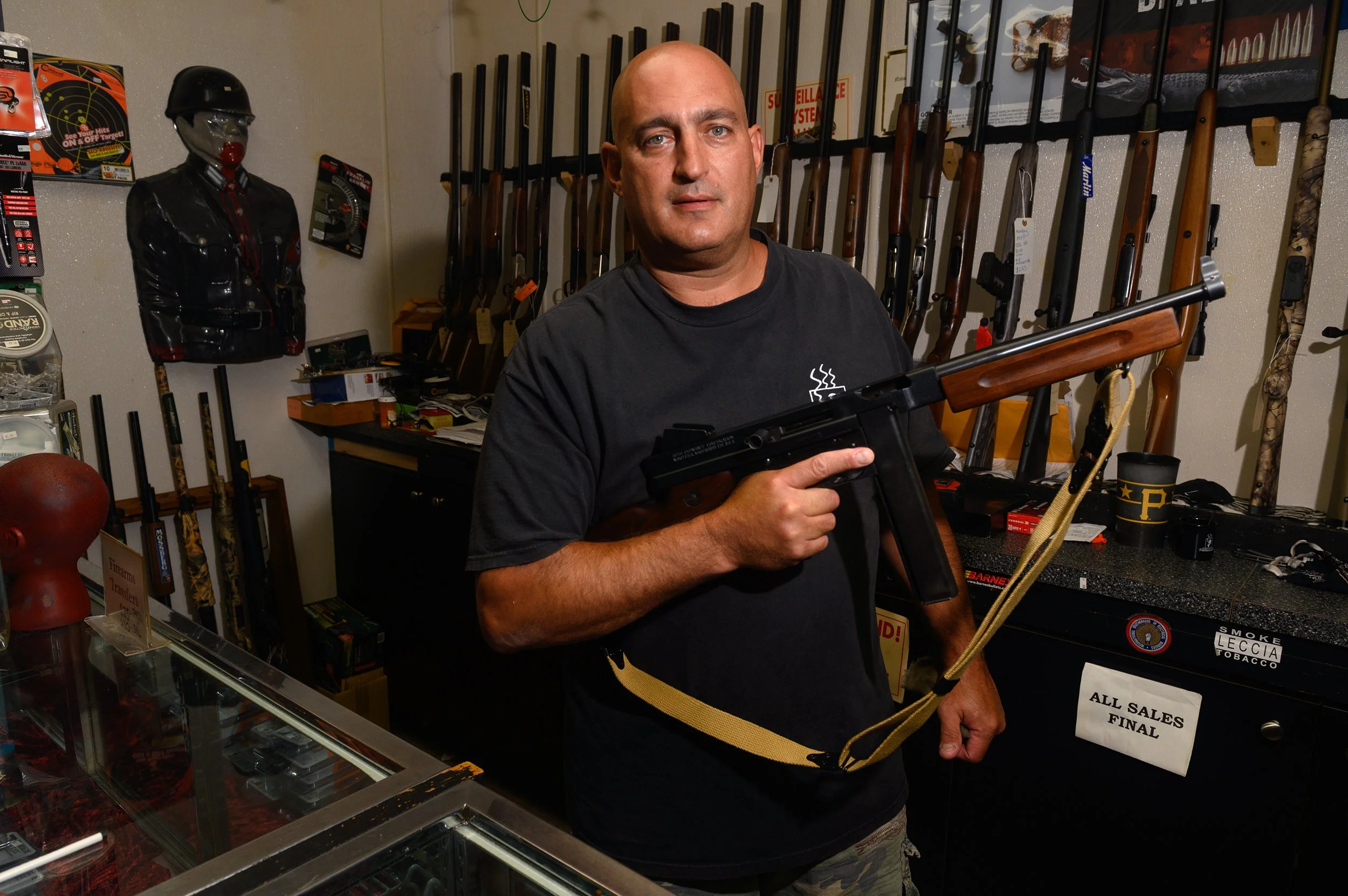  Gregory “Gooch” Ionadi, the owner of Smoke N’ Guns, a cigar, coffeeshop and gun store, in Oakmont, Pa.  