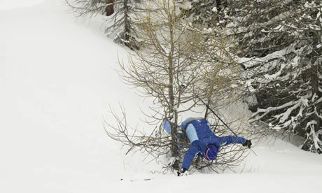 a-male-skier-falling-on-a-001.jpg