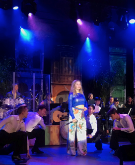 Journey Tupper (MT 19) performs on stage