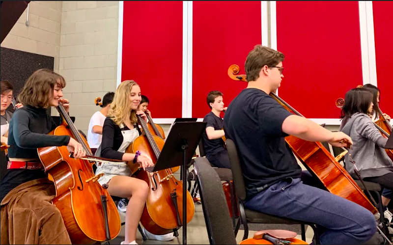 The cello section working hard during Symphony rehearsal.