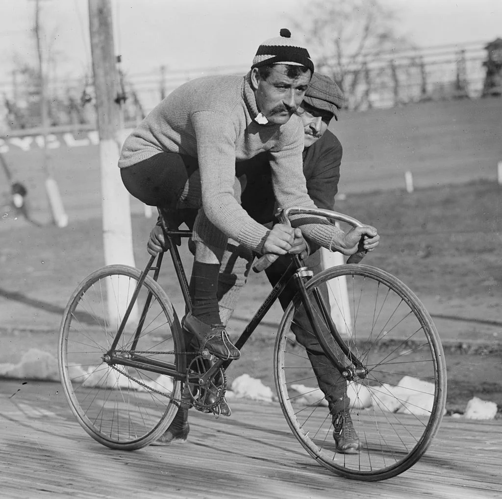 Who is at fault when a cyclist passes a vehicle on the right and an accident ensues?