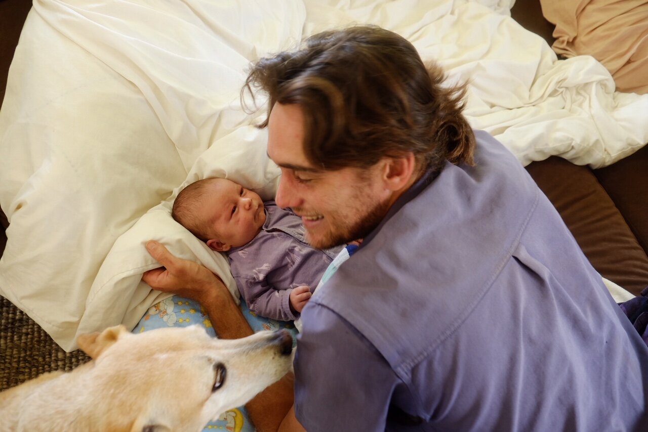 my husband, my knight in shining armor, and reef, our baby's newest guardian (truly, he's taken it upon himself to guard the baby night and day).
