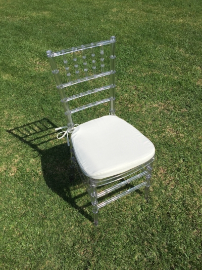 Clear Chiavari Chair with Ivory Cushion Dimensions: 19" wide x 17" deep x 30" tall