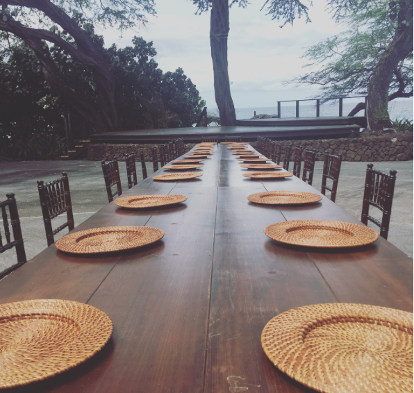 Rattan Chargers on long Farm Tables with Dark Wood Chiavari Chairs