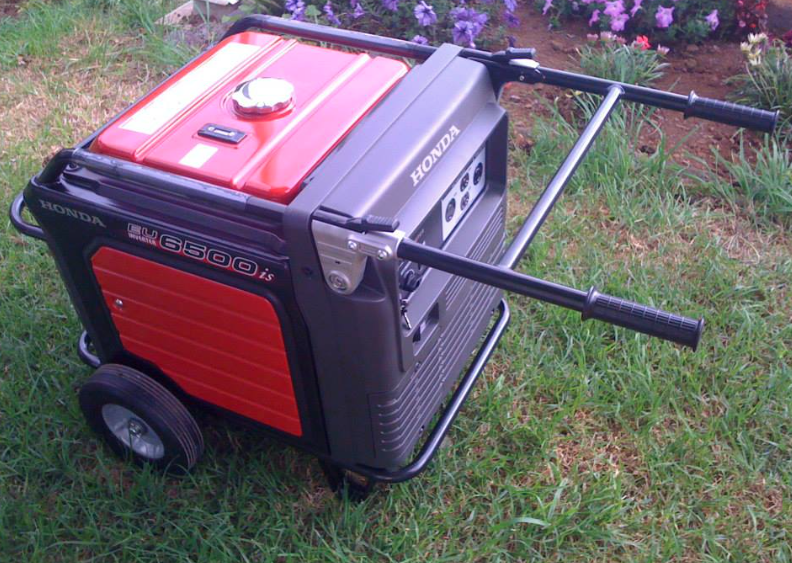 Honda 6500 Whisper Watt. Includes one full tank of gas.