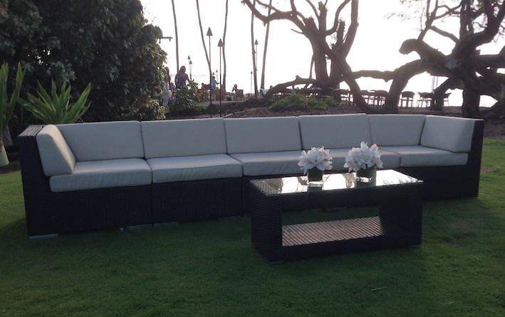 Black Wicker sectional with Creme cushions and matching Black Wicker Coffee Table