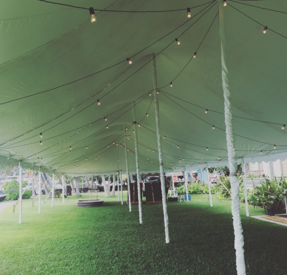 White tents with Leg Covers, and Cafe lighting.