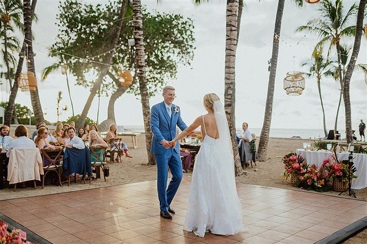 Beautiful beach wedding at the fairmont orchid at coconut grove featuring our dark wood farm tables, cafe lighting, bamboo and three tiered lanterns, cross back chairs, and our teak dance floor. 

Rentals: @bigislandtents 
Coordination: @blissinbloom