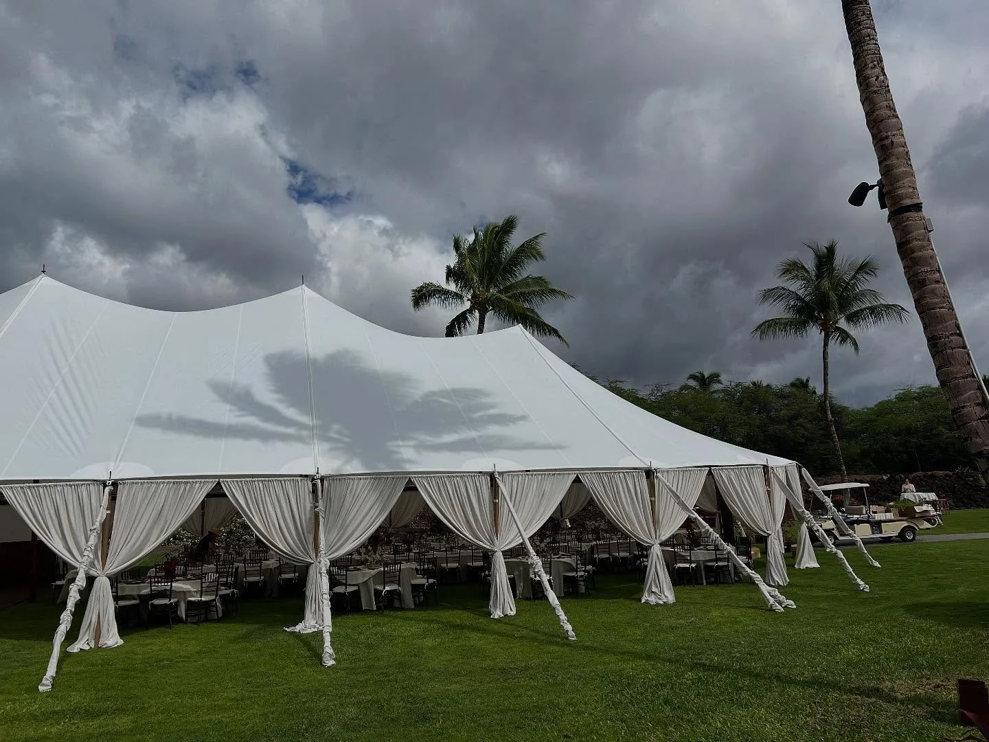 Massive wedding at Mauna Lani this past weekend featuring:
Custom built entry way, stage backdrop, ceremony platform, ceremony aisle way, table number display, staging, interior wood trim, dance floor and custom draping. 
40x sail cloth tent
Dark woo