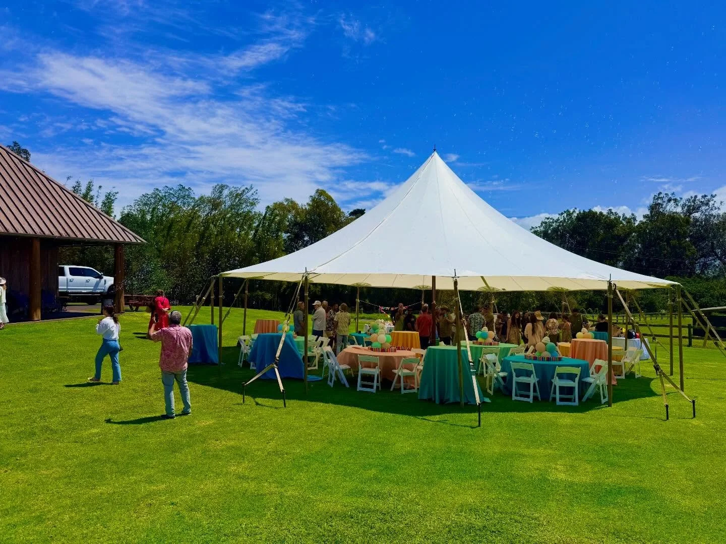 Rainbow themed baby first birthday party featuring our:
40x sail cloth tent
Multiple colored table linens for high boys and round tables
White padded resin folding chairs

@bigislandtents 
#bigislandtents #hawaiievents #bit40xsailclothtent #bitlinens