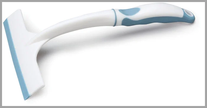 Use a shower squeegee to remove pet hair from the interior of your car
