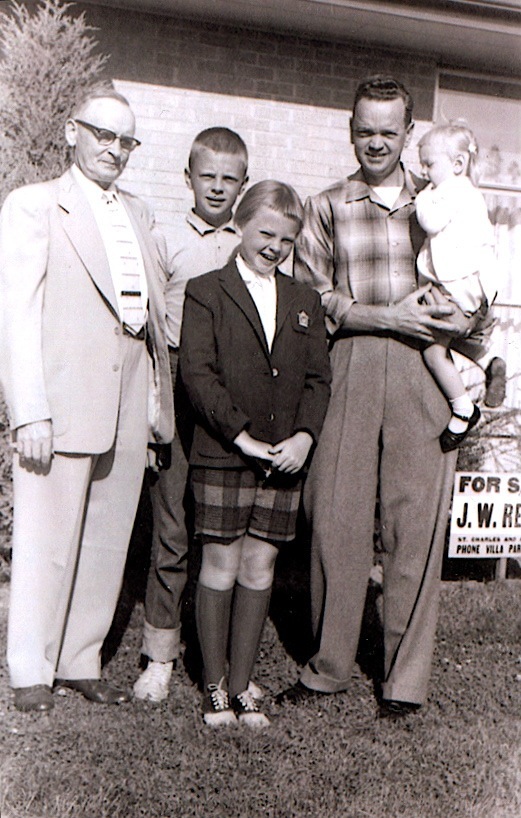 Woody (center back) with his father, grandfather, and two sisters