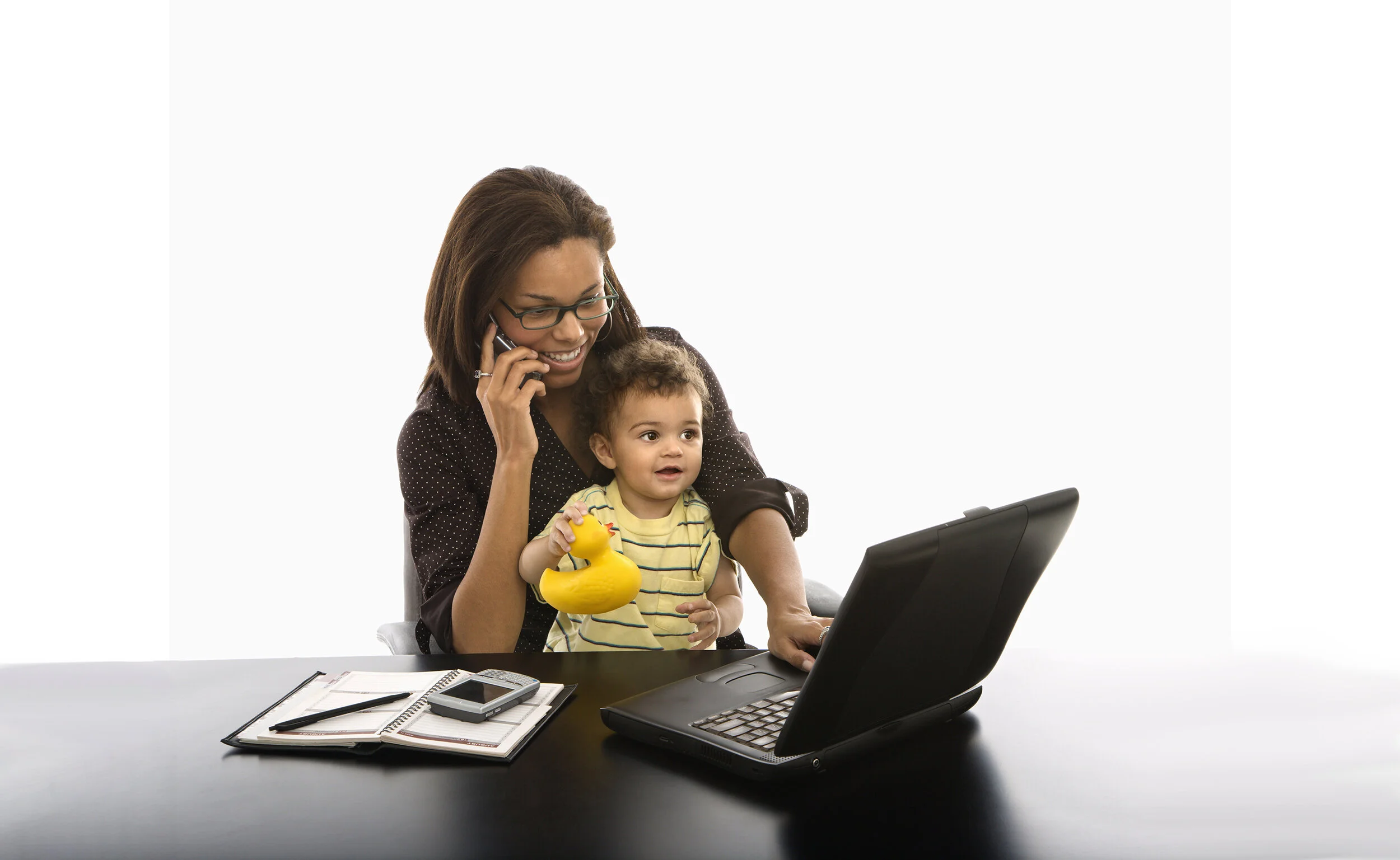 Mom and child on laptop and phone.jpg