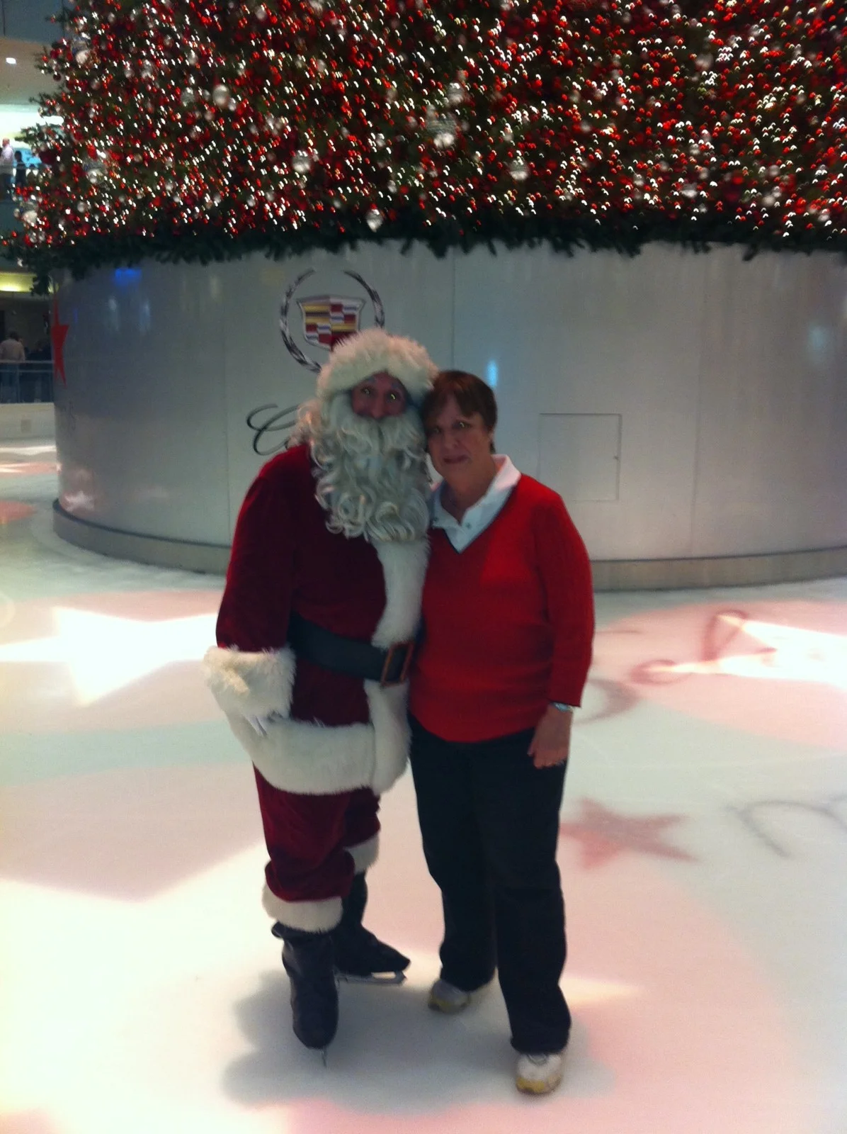 Santa with Ryan Bradley, mom, and an Xmas list