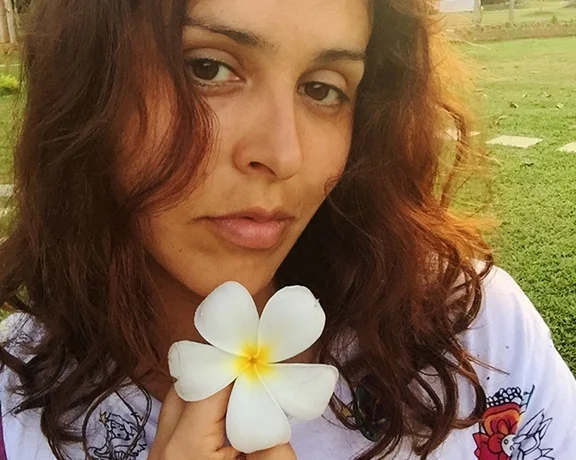 These flowers are called araliya in Singhalese. Plumeria plants grow in tropical regions and have a beautiful floral scent.