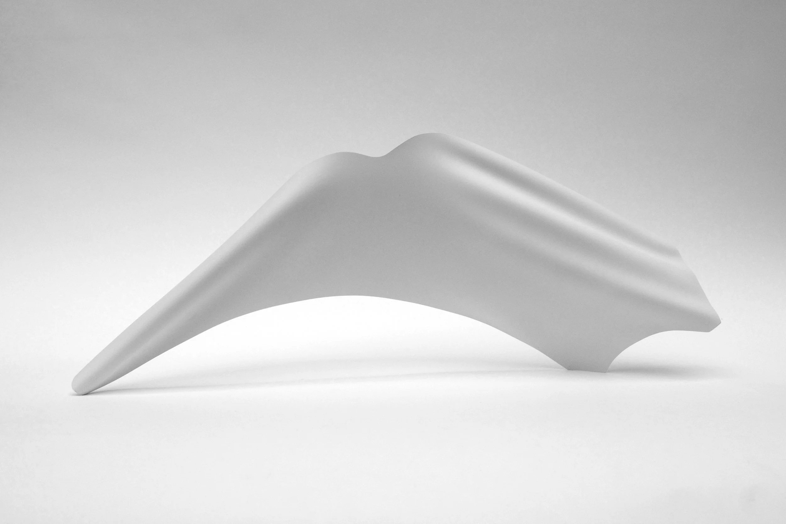 "Planar flow" form. Thermoformed plastic.