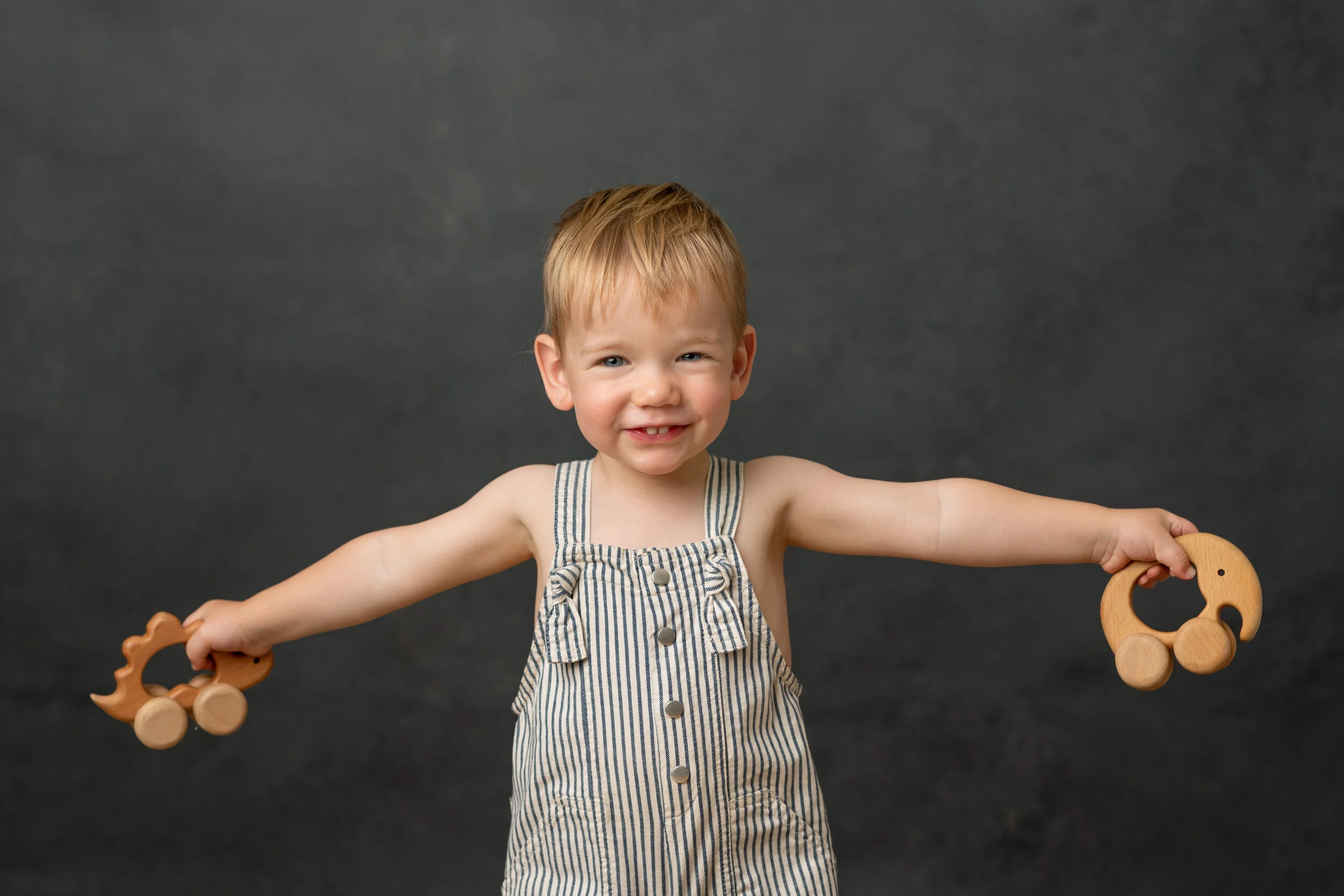 Baby Portraits in Northern NJ | Adam loves our studio toys!