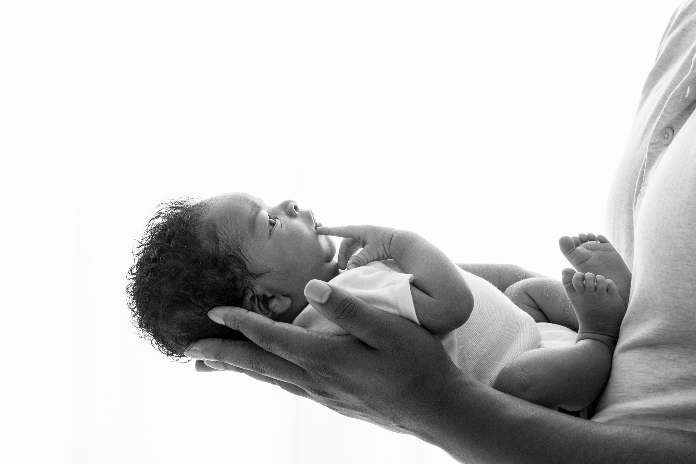  Nicole Hawkins Photography a New Jersey newborn photographer captures a black and white newborn portrait. newborn studio ideas professional NB #nicolehawkinsphotography #NJbabyphotography #newbornportraits #NewJerseyStudioPhotography #newbornsession