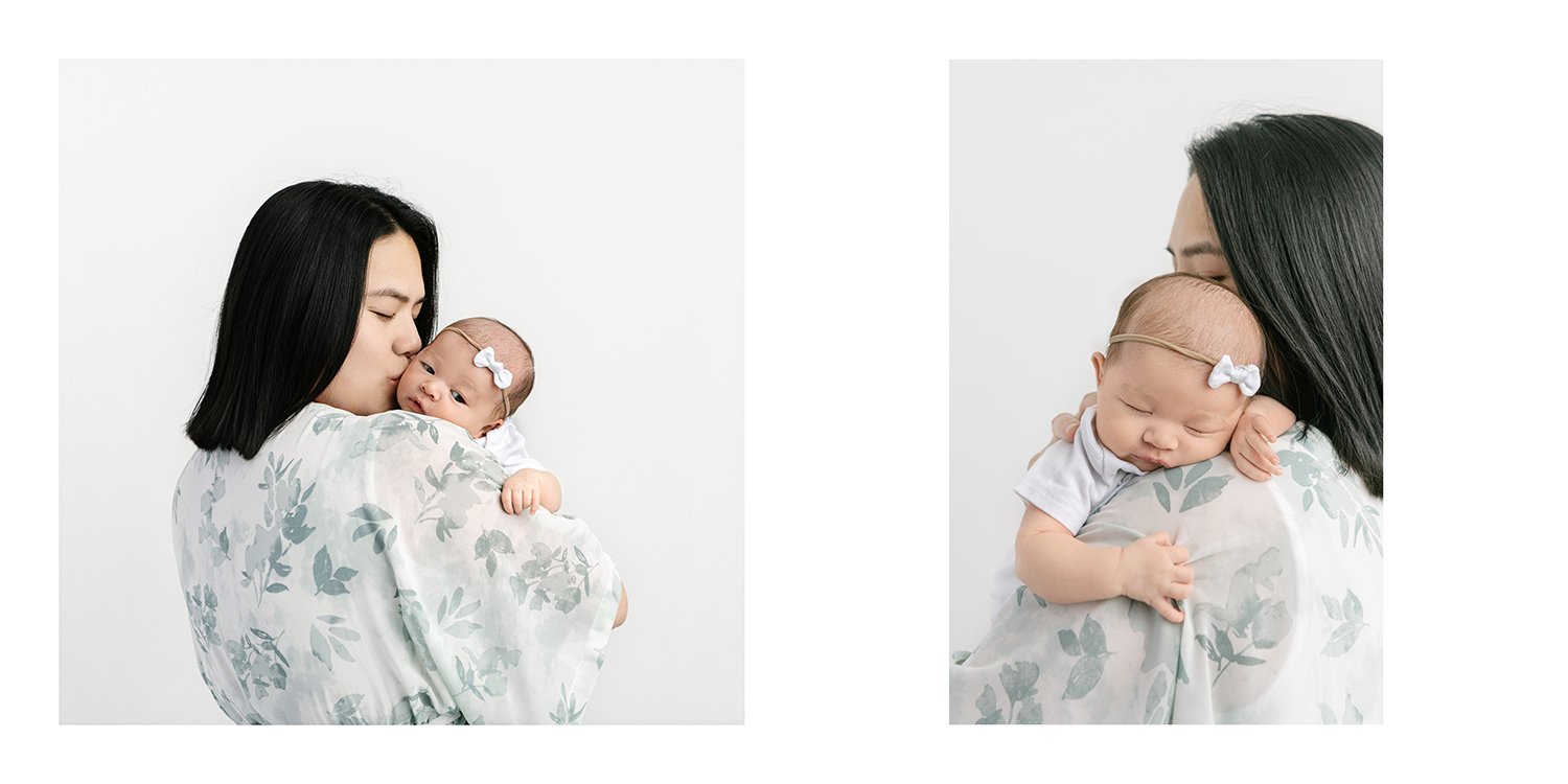 New mom snuggles her baby daughter wearing a blue kimono style dress studio portrait session in New Jersey with Nicole Hawkins #studioportraits #newborn #maplewoodNJ #nicolehawkinsphotography #newjerseyphotographer  #portraitphotography #heirloompho