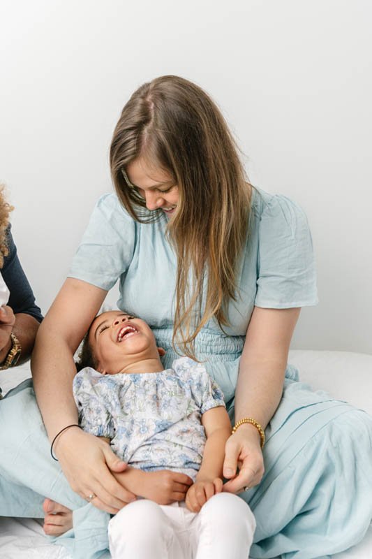  A little girl looks lovingly up at her mother captured by Nicole Hawkins Photography a baby photographer. mother daughter professional #NicoleHawkinsPhotography #NicoleHawkinsBabies #StudioPhotography #NewJerseyPhotographer #twinphotography 