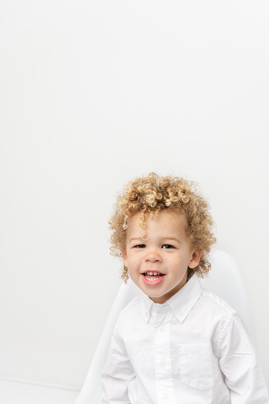  Children Studio Session with a curly hair biracial toddler wearing a white button-down by Nicole Hawkins Photography. toddler style studio #NicoleHawkinsPhotography #NicoleHawkinsBabies #StudioPhotography #NewJerseyPhotographer #twinphotography   