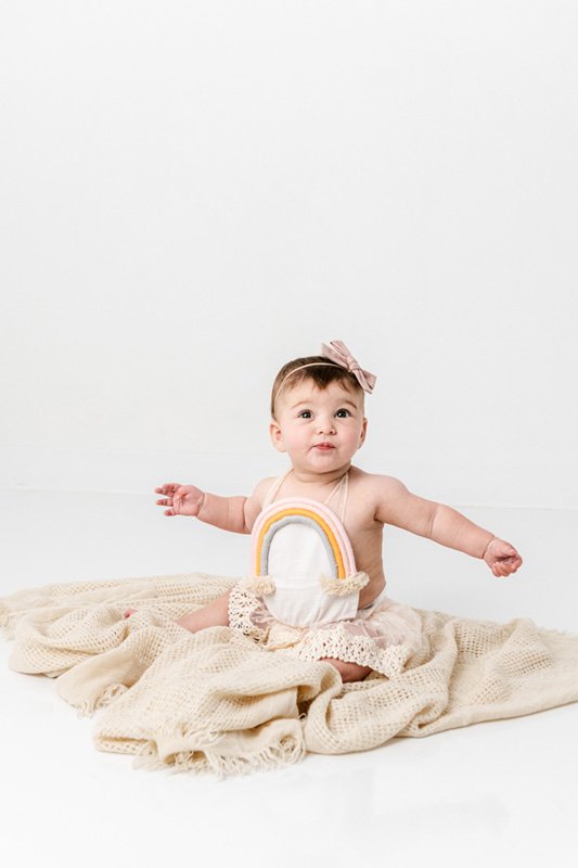  Nicole Hawkins Photography captures a portrait of a rainbow baby little girl at six months. Rainbow Baby Portraits Little girl #sixmonthbabyportraits #NJPhotographer #NicoleHawkinsPhotography #NicoleHawkinsBabies #BabyStudioPhotography    